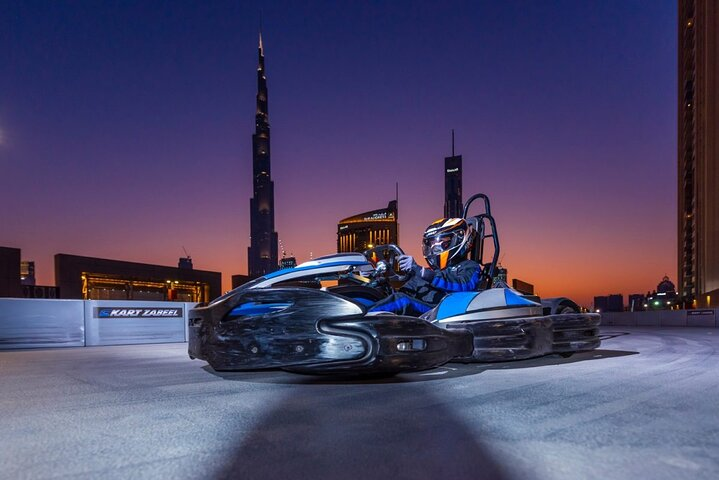 Experience the excitement of rooftop go-kart racing as you speed past iconic skyline views making unforgettable memories with friends and family at EKart Zabeel in Dubai.